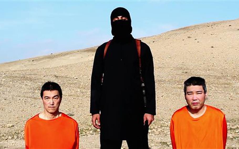 This image taken from an online video released by the Islamic State group's al-Furqan media arm on Tuesday, Jan. 20, 2015, shows the group threatening to kill 2 Japanese hostages Kenji Goto Jogo, left, and Haruna Yukawa, right. The men were later killed.