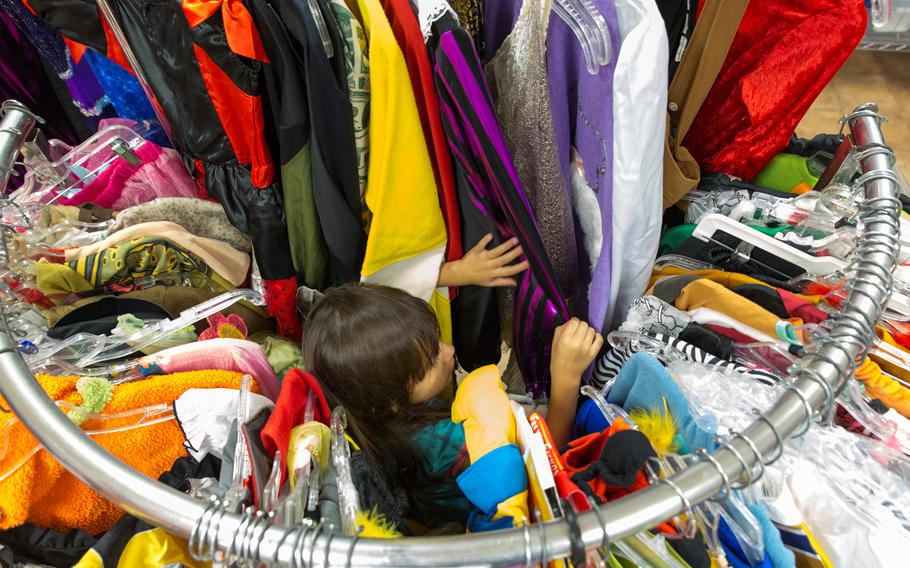 Community residents shop at a thrift-store appreciation event Sept. 27, 2014, at Marine Corps Air Station Iwakuni, Japan.