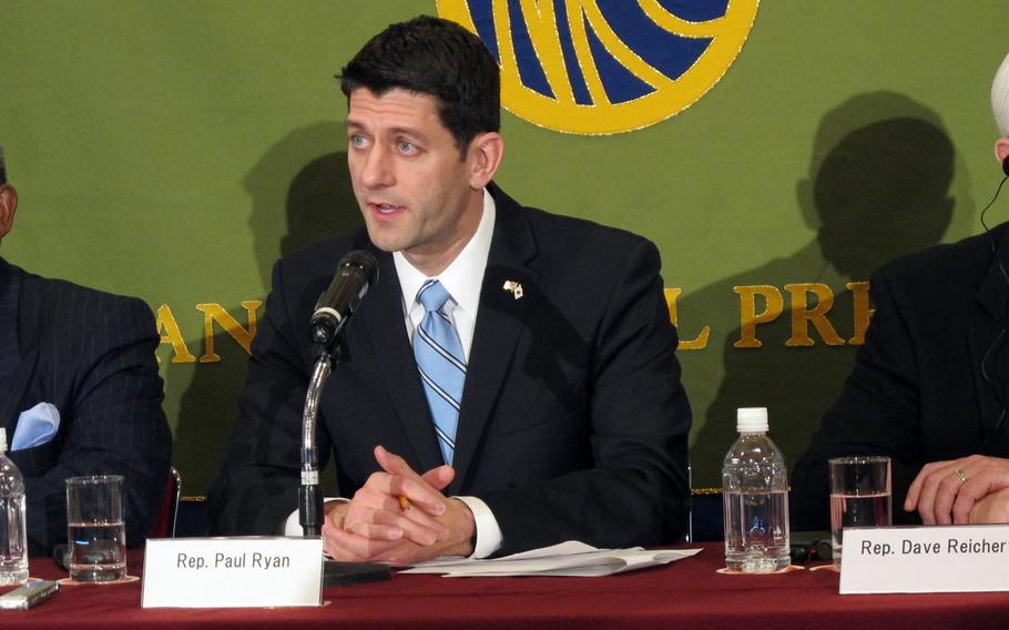 Rep. Paul Ryan, R-Wisc., speaks with reporters about the Trans-Pacific Partnership on Thursday, Feb. 19, 2015, in Tokyo. Ryan and seven other congressmen were scheduled to meet with Japanese Prime Minister Shinzo Abe later in the day.