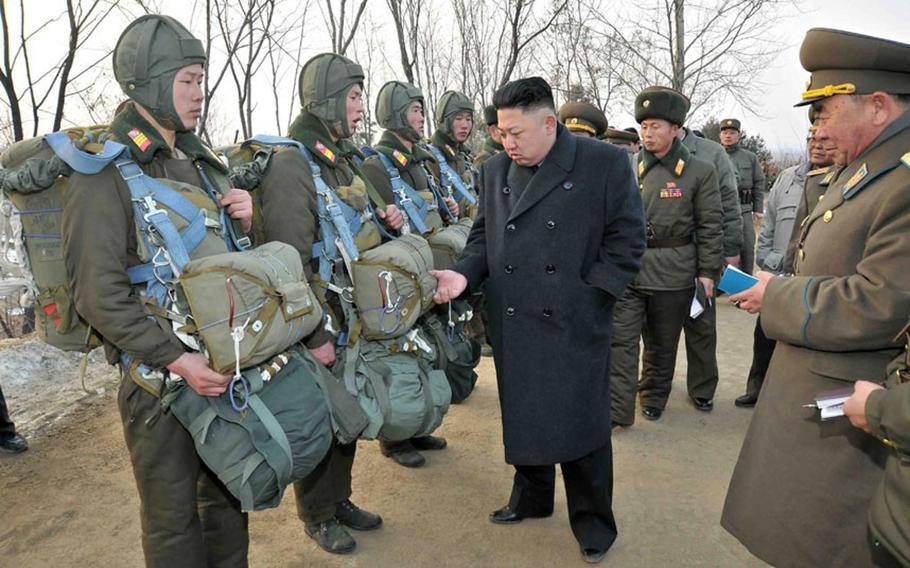 North Korean leader Kim Jong Un inspects some of his troops in this undated photo.