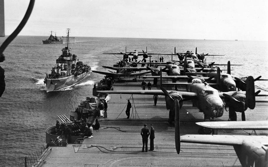 Heavily armed escorts follow the USS Hornet to protect its lethal cargo of B-25 bombers during the Doolittle Raids on the Japanese mainland April 18, 1942.