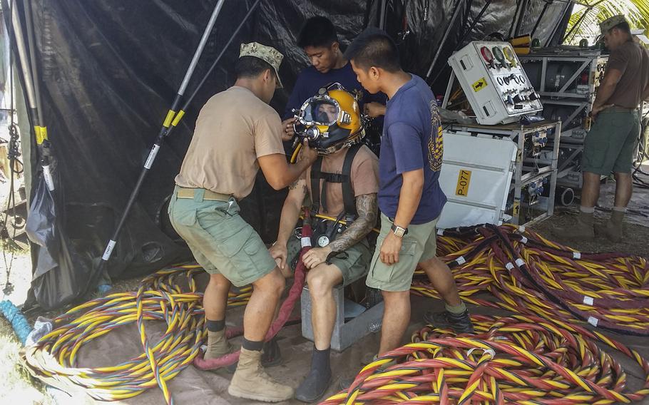 U.S. Navy Seabees from Underwater Construction Team 2 and Philippine Seabees from 1st Naval Construction Battalion participate in diving training aboard Naval Base Heracleo Alano, Sangley Point, Cavite City, as part of Balikatan 2014. The U.S. is more than doubling its troop presence for the 2015 Balikatan exercise.