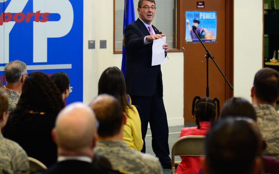 Defense Secretary Ash Carter praises the kids of the Yokota Air Base community during a visit to the base Thursday, April 9, 2015. It was his first visit since taking over as defense secretary.