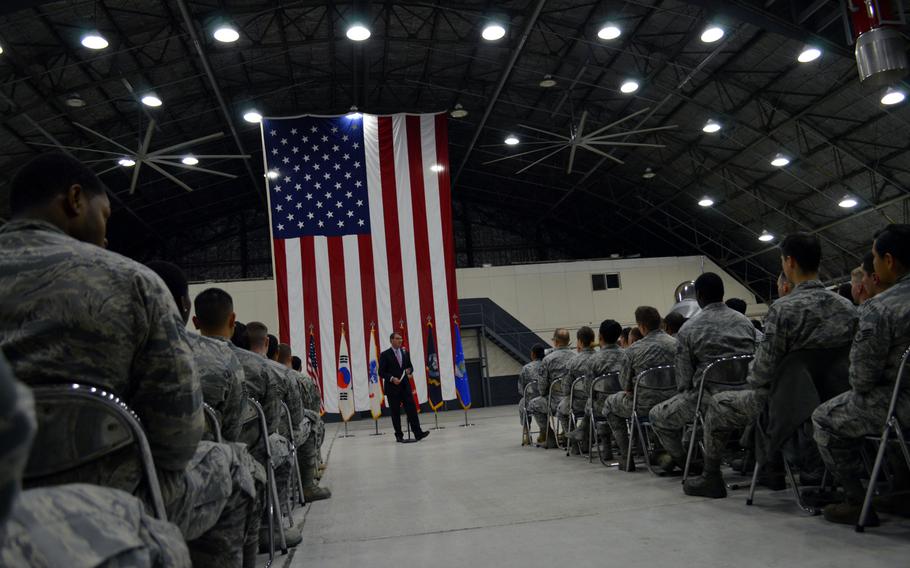 Troops listen to Defense Secretary Ash Carter speak at Osan Air Base, South Korea on April 9, 2015. After the speech, troops were allowed to ask the Carter questions.

