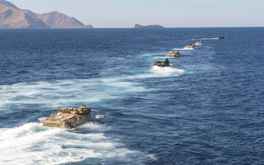 Amphibious assault vehicles depart the well deck of the amphibious transport dock ship USS Green Bay during exercise Balikatan in the Philippine Sea on April 18, 2015. A new defense agreement between the U.S. and the Philippines identifies eight bases in the country to which U.S. would have access. 