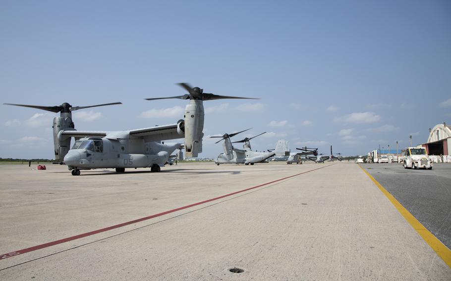 U.S. Marines with Marine Medium Tiltrotor Squadron (VMM) 262, 1st Marine Aircraft Wing, prepare to depart Marine Corps Air Station Futenma, Okinawa, Japan, April 30, 2015. VMM-262 will be pre-staging aircraft on Clarke Air Base, Philippines in preparation to support humanitarian assistance and disaster relief operations following the earthquake in Nepal. 