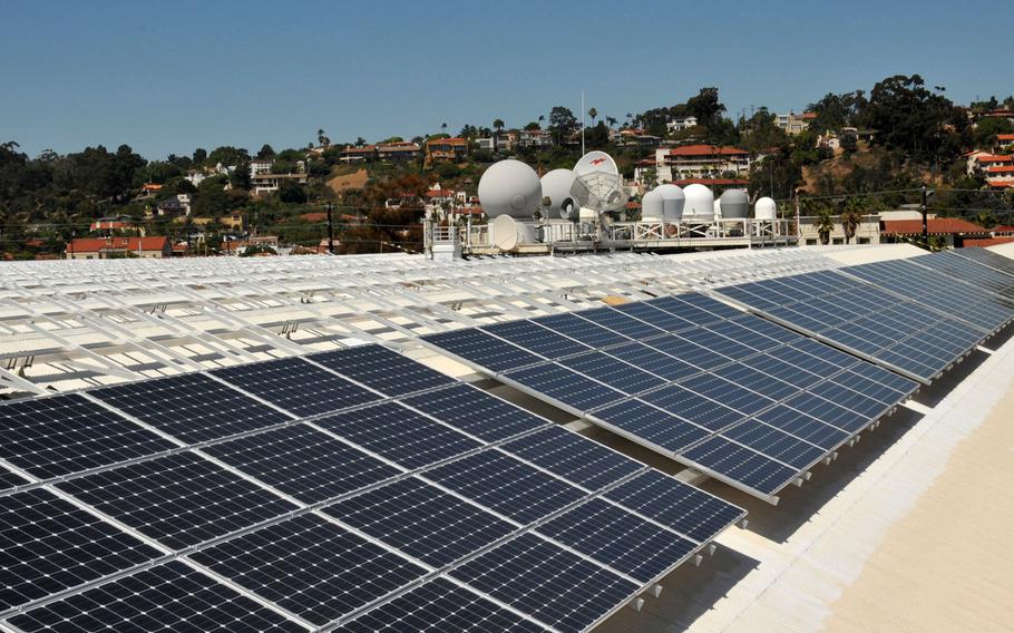 In this file photo from Aug. 3, 2011, solar panels are seen on the roof of Space and Naval Warfare Systems Command Headquarters Old Town Complex in San Diego.
