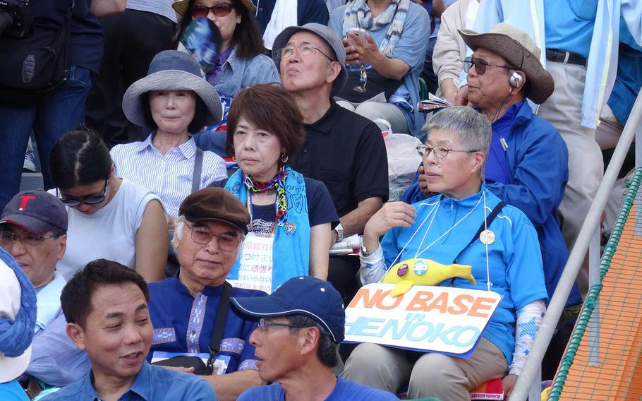 Protesters and their supporters gather Sunday at Okinawa, Japan's largest baseball stadium to voice their opposition to a new military runway that requires landfill work at Oura Bay, adjacent to U.S. Marine Corps Camp Schwab, Sunday, May 17, 2015. Environmentalists claim that the landfill work disrupts feeding patterns of dugongs, an endangered marine mammal, which reportedly have been seen near the bay. 

