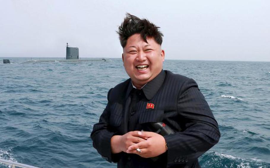 In this undated photo released by North Korea's official Korean Central News Agency in Pyongyang on May 9, 2015, North Korean leader Kim Jong Un watches the test-fire of a strategic submarine underwater ballistic missile.