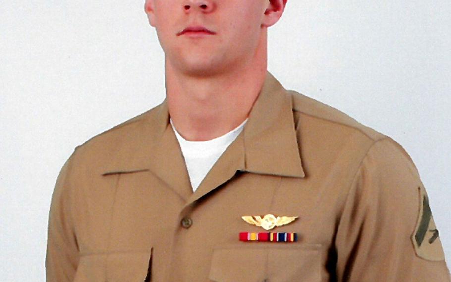 This undated photo provided by the US Marine Corps shows Lance Cpl. Joshua E. Barron, 24, of Spokane, Wash. Military officials have identified Barron, who was killed when a military aircraft crashed during a training exercise in Hawaii on Sunday, May17, 2015. The Marine Corps says Barron died of injuries sustained when the MV-22 Osprey went down Sunday at a military base outside Honolulu.