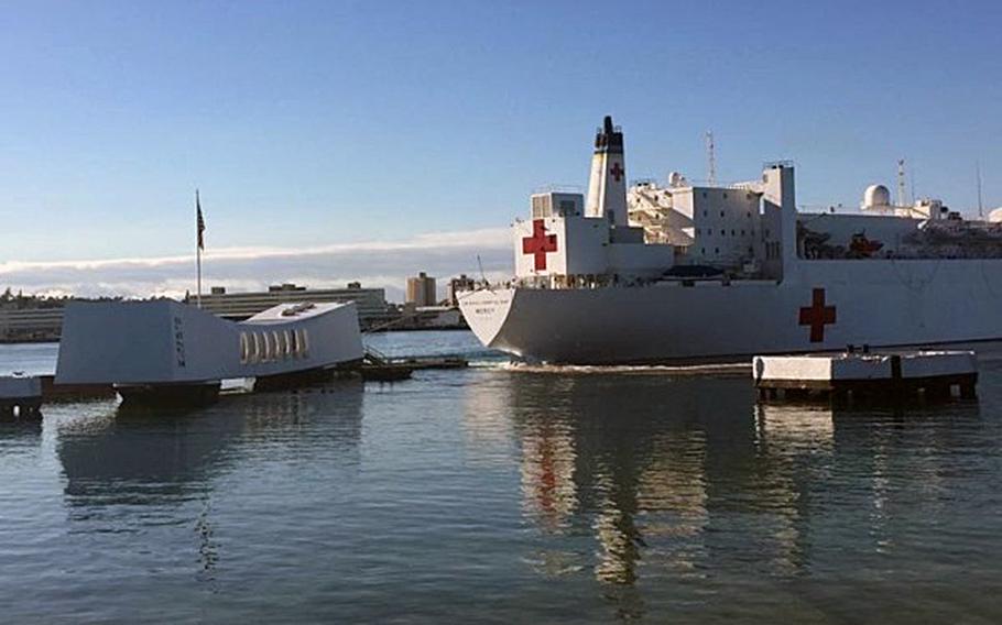 The USNS Mercy is seen very close to the USS Arizona Memorial in Pearl Harbor, Hawaii on Wednesday, May 27, 2015.