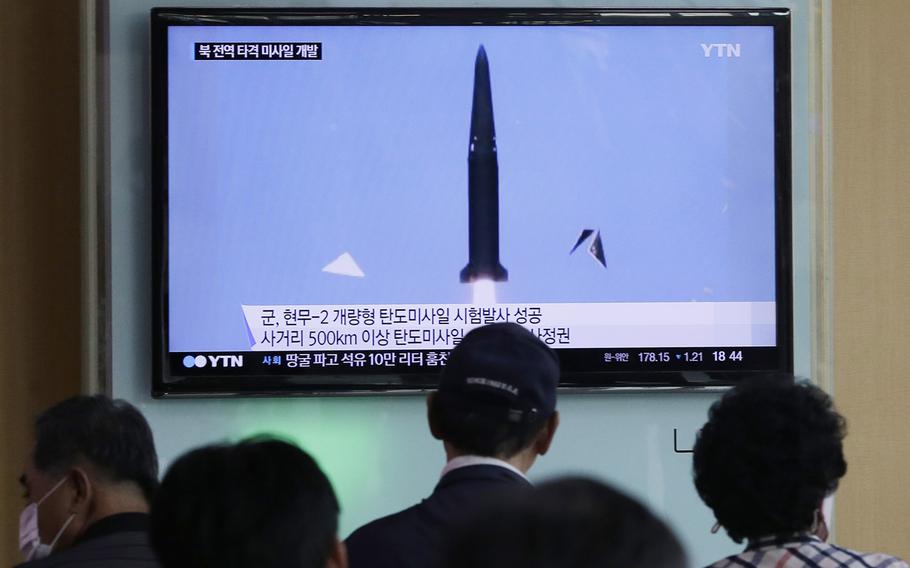 People watch a TV news program showing  South Korea's missile test at Seoul Railway Station in Seoul, South Korea, on June 3, 2015. South Korea on Wednesday successfully test-fired a domestically built ballistic missile that can hit all of North Korea, an official said.