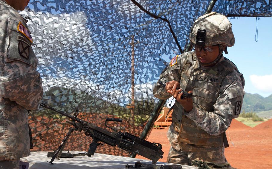 A soldier demonstrates his knowledge of weapons during the 2015 U.S. Army Pacific Best Warrior Challenge on June 9, 2015, at Schofield Barracks, Hawaii.