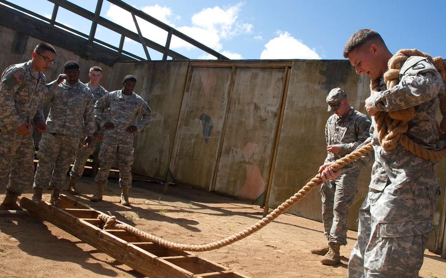 Competitors in the 2015 U.S. Army Pacific Best Warrior Challenge are tested on their leadership ability at the Leaders Reaction Course, June 10, 2015, at Schofield Barracks, Hawaii.