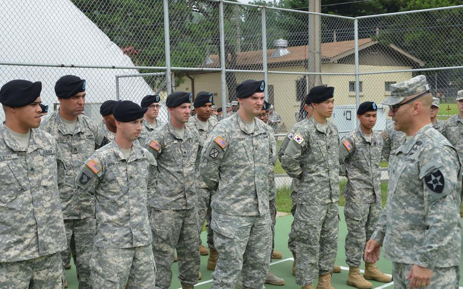 Command Sgt. Maj. Andrew Spano, the senior enlisted adviser of 2nd Infantry Division, talks to the graduates of the Eighth Army Wightman Noncommissioned Officer Academy Warrior Leaders Course from the division June 20, 2014 on Camp Jackson, South Korea.