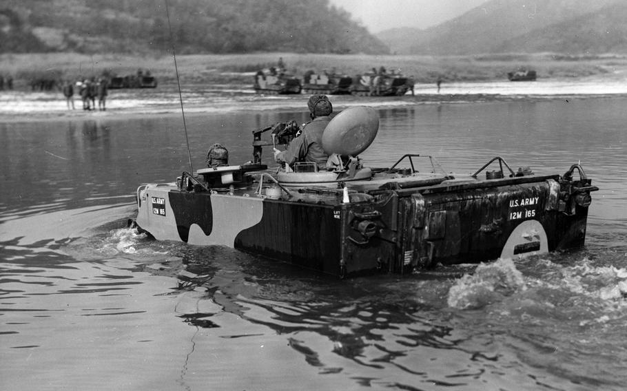 An M113 Armored Personnel Carrier from the 1st 'Iron' Brigade Combat Team returns to the north shore of the Imjin River in South Korea after completing a practice crossing. Army units that have spent the past 5 decades on the peninsula will deactivate on July 2, 2015.