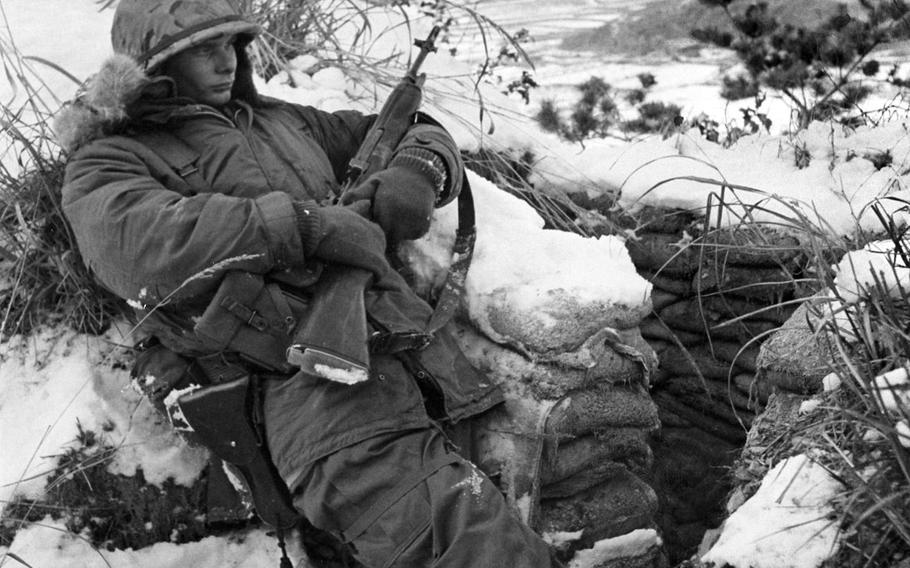 A 1st Battalion, 72nd Armored Regiment soldier stands watch on Hill 151 during an exercise in South Korea on Dec. 23, 1966. On July 2, 2015, units belonging to the 2nd Infantry Division's 1st Brigade Combat Team will inactivate, marking the end of more than 50 years on the peninsula.