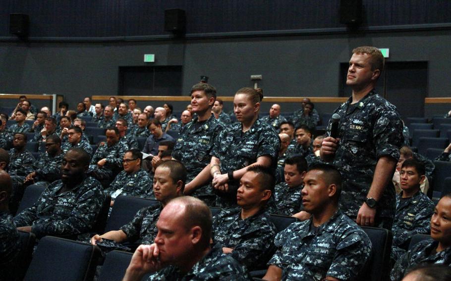 Sailors at Yokosuka Naval Base, Japan, ask Master Chief Petty Officer of the Navy Michael D. Stevens questions during an all-hands visit on June 22, 2015.