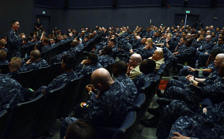 Master Chief Petty Officer of the Navy Michael D. Stevens speaks to sailors at Yokosuka Naval Base, Japan, during an all-hands visit June 22, 2015. Stevens addressed topics such as uniforms, leadership development and housing allowances for dual-military couples. 