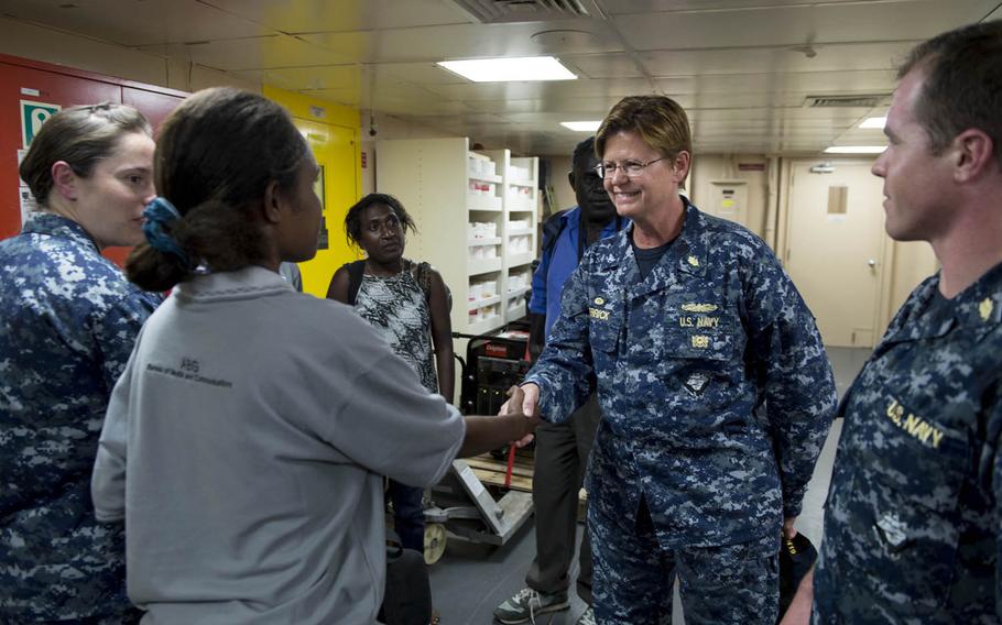 Capt. Melanie Merrick, commanding officer of the hospital aboard USNS Mercy, greets members of the local media on board the ship after arriving Saturday for Pacific Partnership 2015 missions. Mercy, carrying 900 personnel from the United States, Japan, Australia, New Zealand and Timor Leste, is scheduled to be in Arawa through July 3 and then move on to Rabaul, Papua New Guinea. The ship, which has already completed a visit to Fiji, will also make stops in the Philippines and Vietnam.