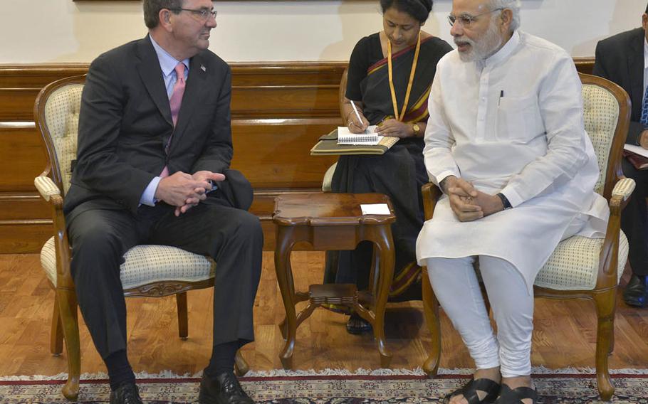 Secretary of Defense Ash Carter, left, meets with Indian Prime Minister Narendra Modi in June in New Delhi, India. Defense relations between the U.S. and India have never been stronger, analysts say.