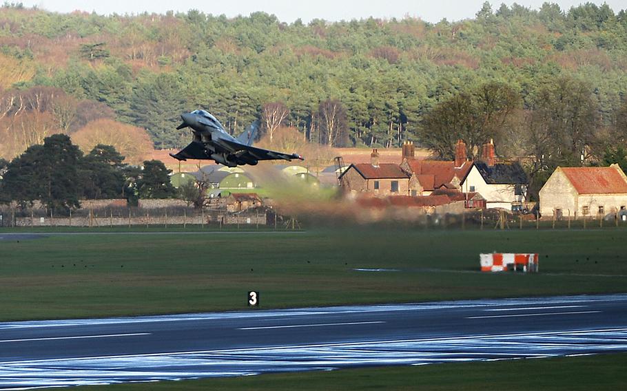 A Eurofighter Typhoon assigned to Royal Air Force Coningsby takes off from Royal Air Force Lakenheath, England, Dec. 8, 2015. 