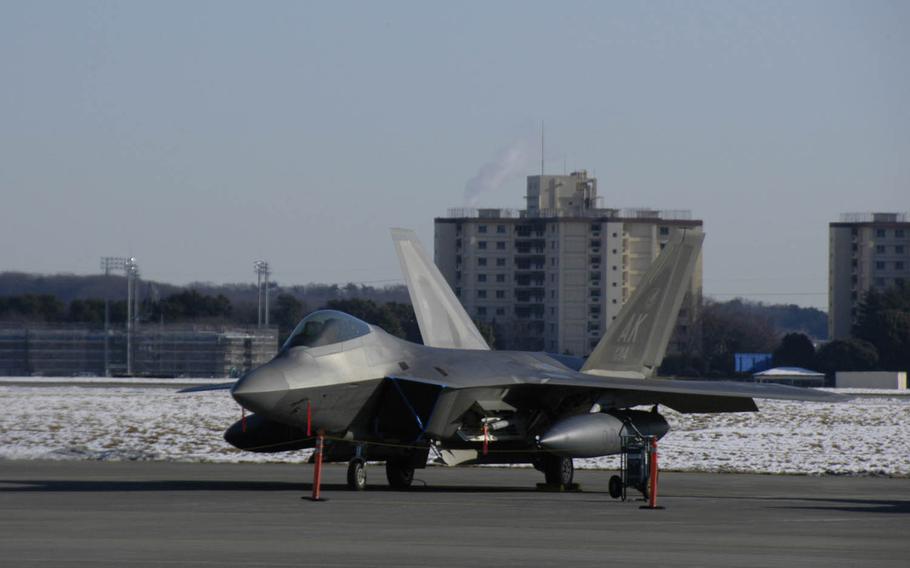 A group of F-22 Raptor stealth fighters that arrived at Yokota Air Base, Japan, Wednesday, Jan. 20, 2016, will be joined by F-16s from the 18th Aggressor Squadron, Eielson Air Force Base, Alaska, U.S. officials said. 