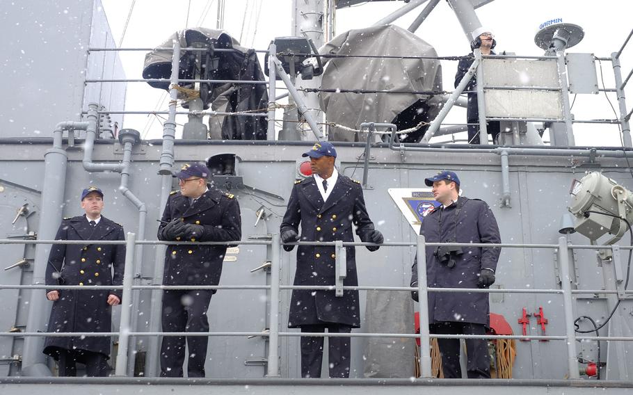 Crewmembers from the USS Patriot oversee line handling and mooring operations from the deck of the mine-countermeasures ship in Otaru, Japan, on Thursday, Feb. 4, 2016. The ship has planned a three-day rest-and-recuperation visit.


