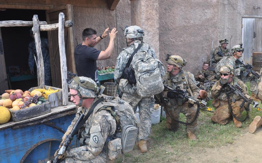 Soldiers interrogate a possible terrorist during a mock raid during Exercise Lightning Forge Feb. 5, 2016, at Marine Corps Training Area Bellows.

Wyatt Olson
Stars and Stripes