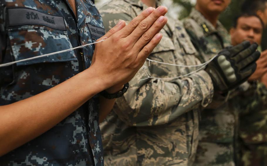 Servicemembers from the U.S., Thailand, China and Singapore participate in a ceremony for exercise Cobra Gold 2016 in Wuat Ban Mak, Saraburi, Thailand. Pacific Pathways 2016 kicked off this month with the arrival of soldiers from Joint Base Lewis-McChord's 1-2 Stryker Brigade Combat Team in Thailand for the exercise.