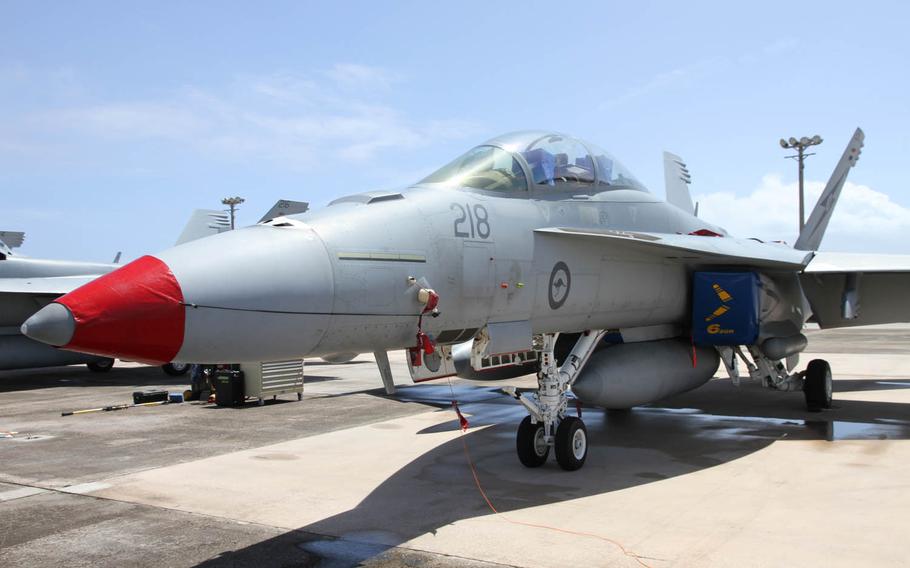 A Royal Australian Air Force F/A-18F Super Hornet fighter jet stands near the runway at Andersen Air Force Base, Guam, for use in the Cope North exercise, Wednesday, Feb. 17, 2016. It's the second time the RAAF has brought Super Hornets to the annual exercise.
