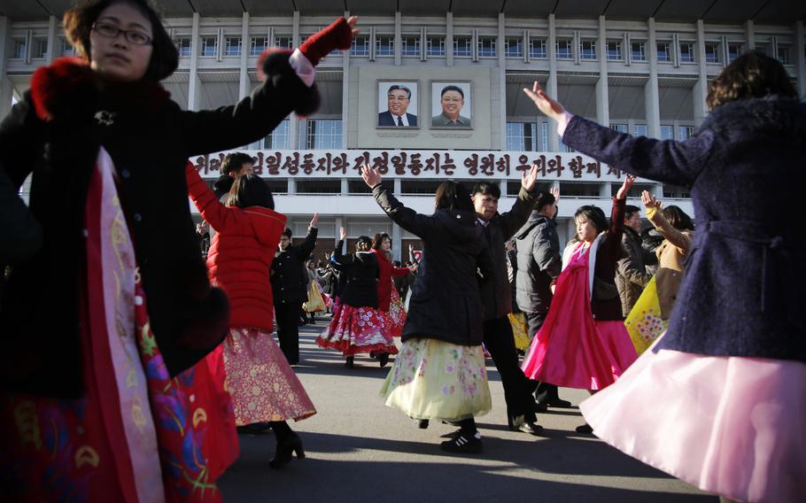 North Koreans perform a dance as part of celebrations of the Day of the Shining Star, the birthday anniversary of late North Korean leader Kim Jong Il in Pyongyang, North Korea, on Feb. 16, 2016. Few countries have endured sanctions as deep and longstanding as North Korea. But somehow life goes on.