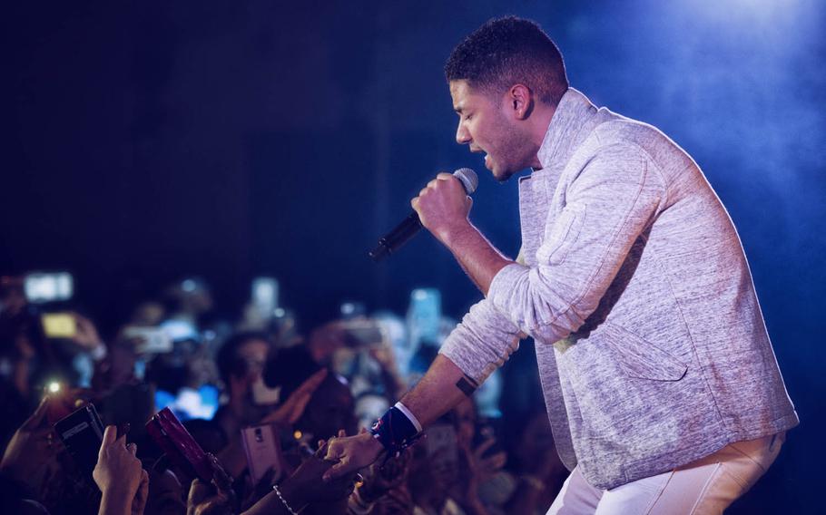 Jussie Smollett, who plays Jamal Lyon on the Fox TV series "Empire," performs at Yokota Air Base, Japan, Dec. 15, 2015. Smollett said that the USO tour was a great opportunity for him to give back and share thanks to servicemembers.