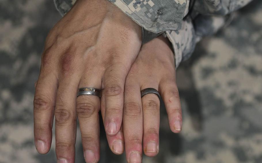 U.S. Army Staff Sgt. Ashely Jacobs, left, and Sgt. 1st Class Rachel Underwood wed in February 2015, five years after the "don't ask, don't tell" act was revoked. South Korea has agreed to a U.S. decision to allow same-sex couples to receive the same legal protection and benefits as other military families under the status of forces agreement. 
