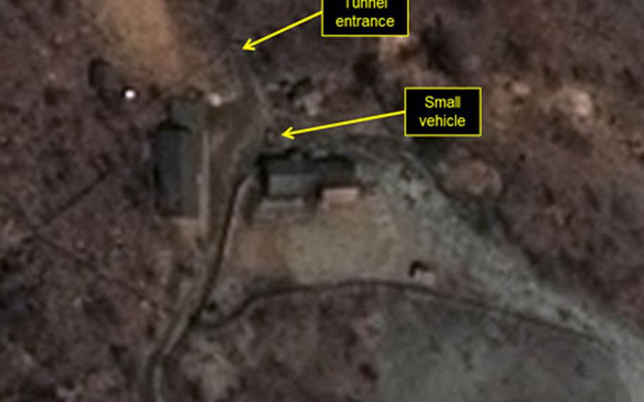 This satellite image taken Tuesday, April 19, 2016, shows the limited movement of vehicles and equipment at the north portal location of the past three North Korean nuclear tests of North Korea's Punggye-ri nuclear test site. While two trailers or vehicles were observed outside the north portal entrance on April 14, only one trailer or vehicle was present on April 19, according to 38 North, a website that monitors North Korean activities.