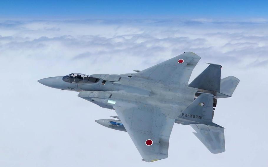 A Japan Air Self-Defense Force F-15 trains in southern Japan in 2015. The number of sorties needed to ward off Chinese aircraft infringing on Japan's airspace has hit an all-time high.