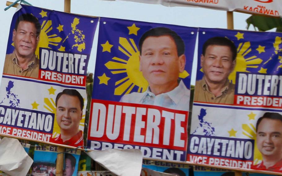 A street corner in downtown Puerto Princesa, Philippines, is plastered with campaign posters. With Filipinos set to choose among five presidential candidates on May 9, 2016, Rodrigo Duterte, the candidate who said the U.S. "should not meddle in our affairs," holds a strong lead, according to the most recent poll released Sunday, April 24, 2016. 