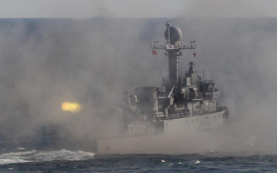 FILE - In this Oct, 17, 2015, file photo, a South Korean navy patrol boat fires during an exercise off South Korea's southeastern coast near Busan, South Korea. South Korea's navy on Friday, May 27, 2016, fired warning shots to chase away two North Korean ships after they briefly crossed a disputed western sea boundary, Seoul defense officials said.