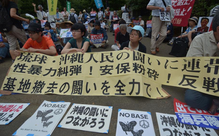 Thousands of Japanese gathered outside the Diet June 29, 2016 to protest the recent slaying of an Okinawan woman, allegedly by a U.S. civilian base worker. Protesters also rallied against security legislation passed last summer by the Abe administration expanding the role of the Japanese Self Defense Force, the continued presence of Marines on Okinawa and other antiwar and nuclear weapon issues. 

