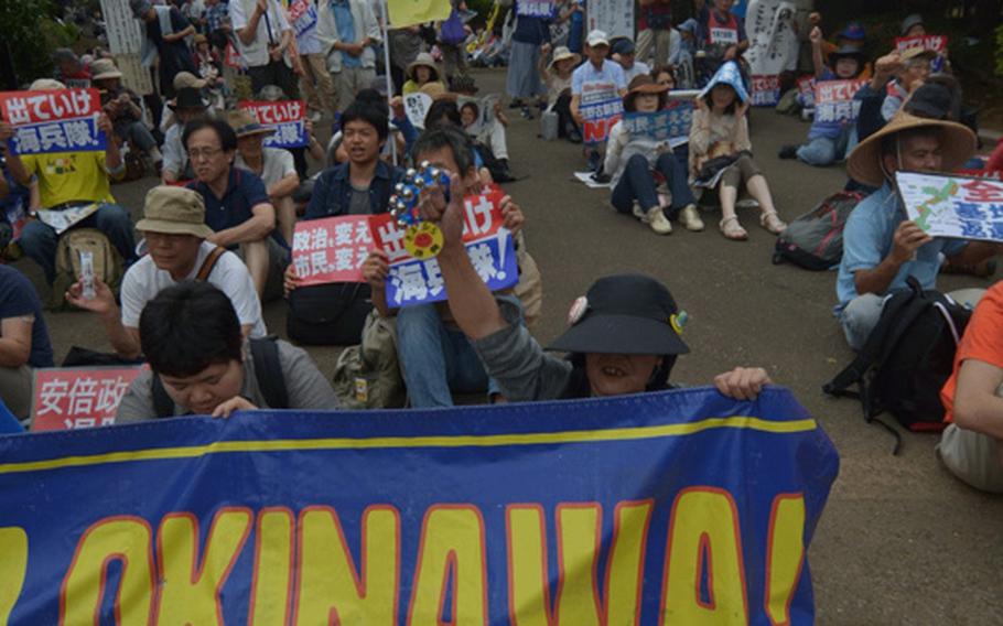 Thousands of Japanese gathered outside the Diet June 29, 2016 to protest the recent slaying of an Okinawan woman, allegedly by a U.S. civilian base worker. Protesters also rallied against security legislation passed last summer by the Abe administration expanding the role of the Japanese Self Defense Force, the continued presence of Marines on Okinawa and other issues. 
