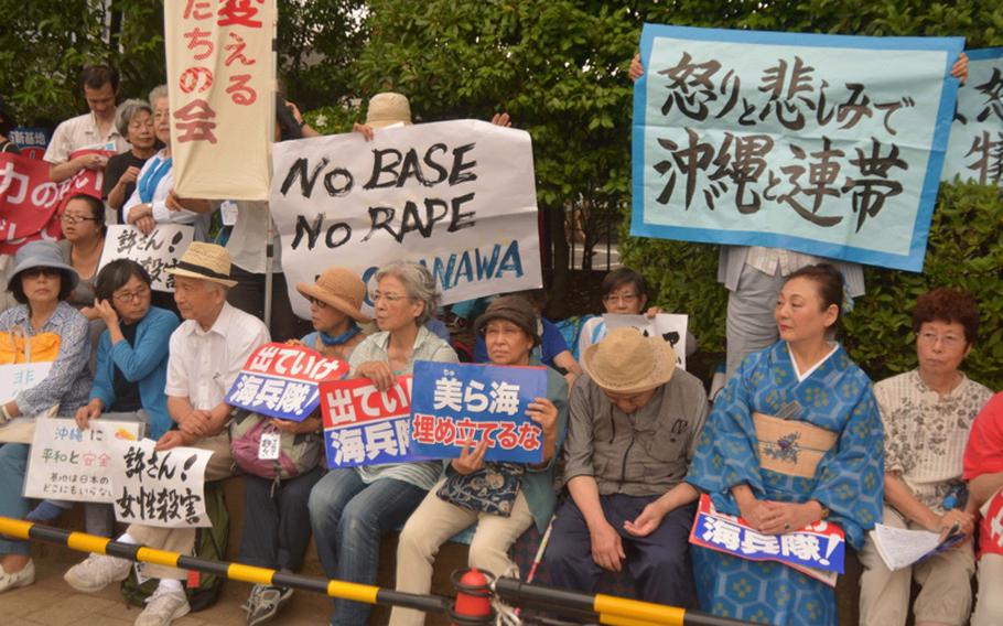 Thousands of Japanese gathered outside the Diet June 29, 2016 to protest the recent slaying of an Okinawan woman, allegedly by a U.S. civilian base worker. Protesters also rallied against security legislation passed last summer by the Abe administration expanding the role of the Japanese Self Defense Force, the continued presence of Marines on Okinawa and other issues. 
