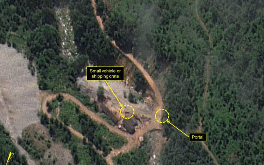 A small vehicle or object can be seen near the west portal of North Korea's Punggye-ri Nuclear Test Site in this Aug. 4, 2016, satellite image from Airbus Defense & Space and 38 North. 