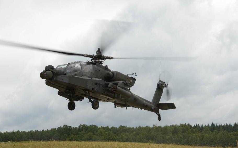 An AH-64D Apache attack helicopter takes part in a drill at Grafenwoehr Training Area, Germany, Aug. 2, 2016. Four U.S. soldiers were injured when two Apaches collided Friday, Aug. 12, 2016, at Camp Humphreys, South Korea.