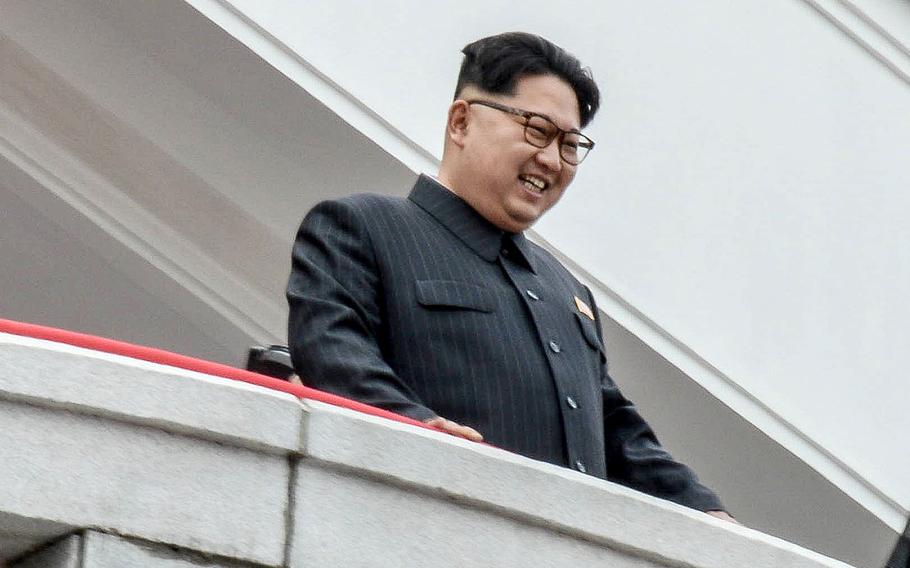 North Korean leader Kim Jong Un looks down on parade participants at the Kim Il Sung Square on Tuesday, May 10, 2016, in Pyongyang, North Korea.