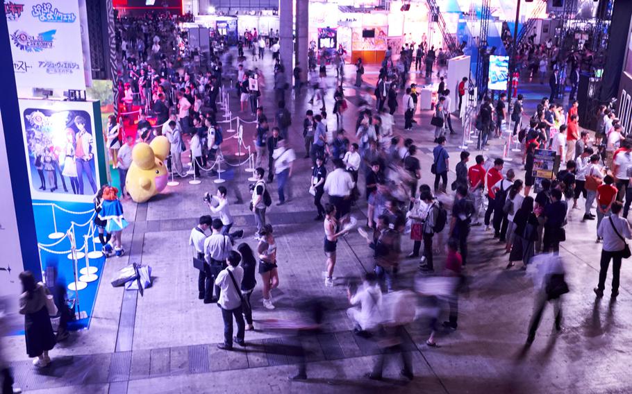 Media and gaming industry insiders crowd the floors of Makuhari Messe convention center in Chiba, Japan, Thursday, Sept. 15, 2016, for Tokyo Game Show 2016. More than 230,000 people are expected to attend the convention through Sunday. 