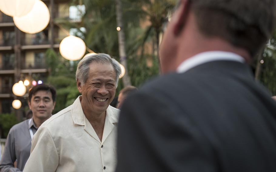 Secretary of Defense Ash Carter speaks with Singapore's defense minister Ng Eng Hen on Thursday, Sept. 29, 2016, during a reception in Kapolei, Hawaii, the day before the Association of Southeast Asian Nations' conference begins.