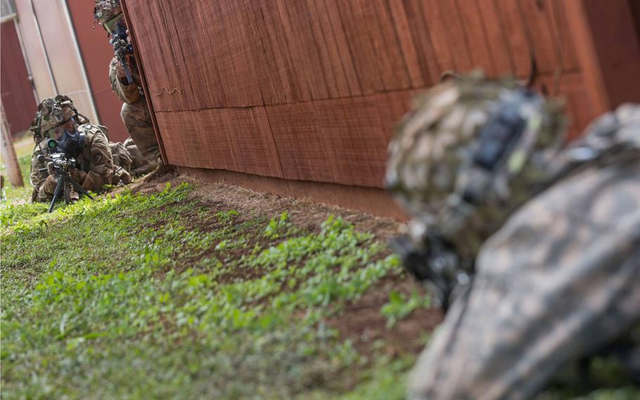 25th Infantry Division soldiers conduct maneuver drills at Area X-ray on Schofield Barracks during Lightning Forge exercises on Oahu.