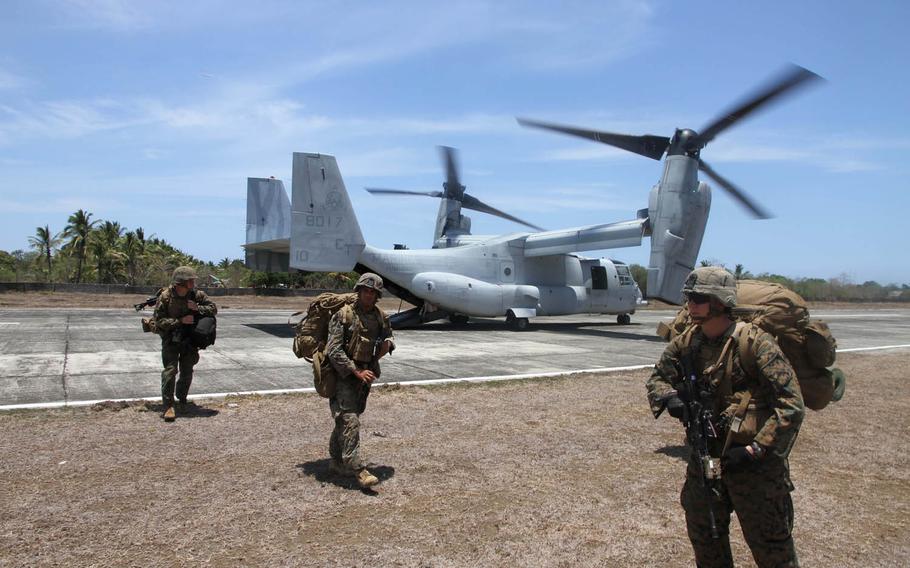 U.S. Marines disembark from an MV-22 Osprey after landing at an airstrip in Panay, Philippines, on April 11, 2016. Despite vocal opposition from Philippine President Roberto Duterte, U.S. and Philippine special forces were to begin annual combat exercises on Wednesday, Nov. 16, 2016.