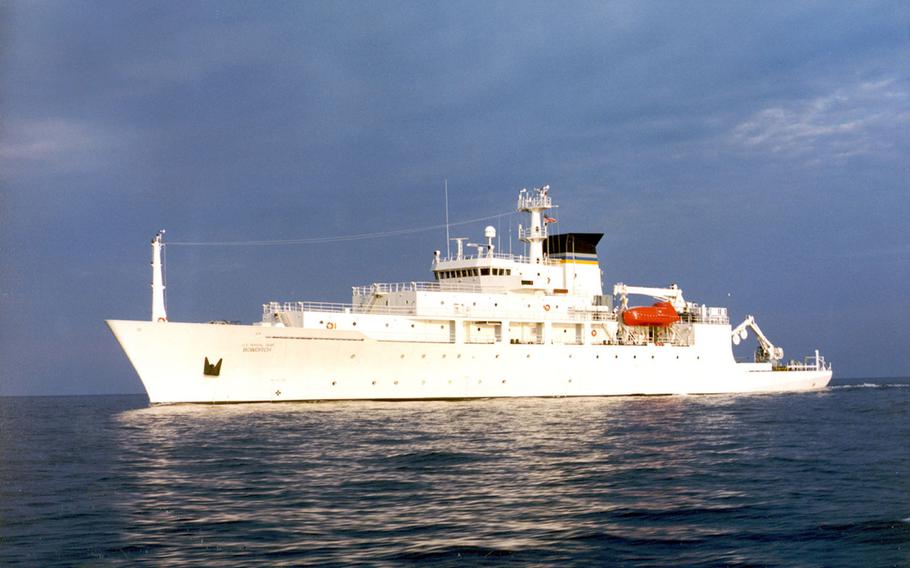In this undated photo released by the U.S. Navy Visual News Service, the USNS Bowditch, a T-AGS 60 Class Oceanographic Survey Ship, sails in open water. The USNS Bowditch, a civilian U.S. Navy oceanographic survey ship, was recovering two drones on Thursday when a Chinese navy ship approached and sent out a small boat that took one of the drones, said Navy Capt. Jeff Davis, a Pentagon spokesman. He said the Chinese navy ship acknowledged radio messages from the Bowditch, but did not respond to demands the craft be returned.