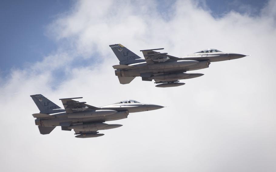 Two F-16 Fighting Falcons depart from Luke Air Force Base, Ariz. on their way to their new homes at Holloman Air Force Base, N.M., June 16, 2015. 